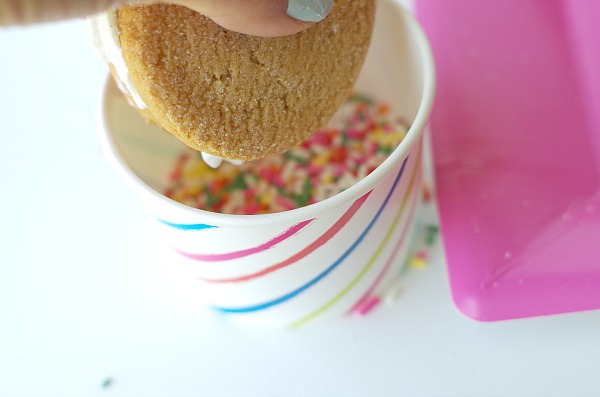 dip ice cream sandwich in sprinkles