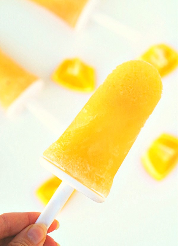 Orange juice and champagne in a yummy mimosa popsicle