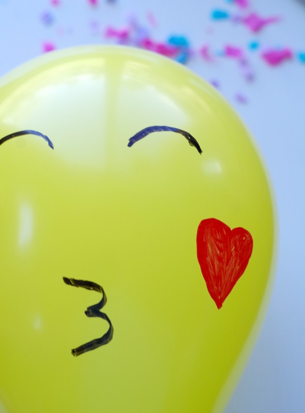 blowing kiss emoji balloon