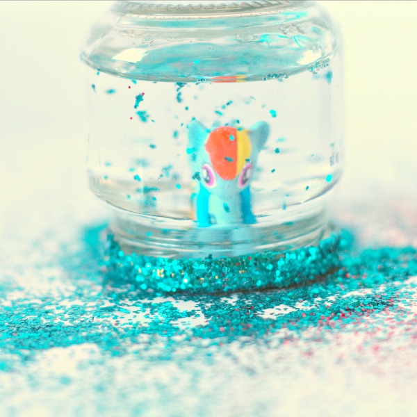 Small glitter toy snow globe
