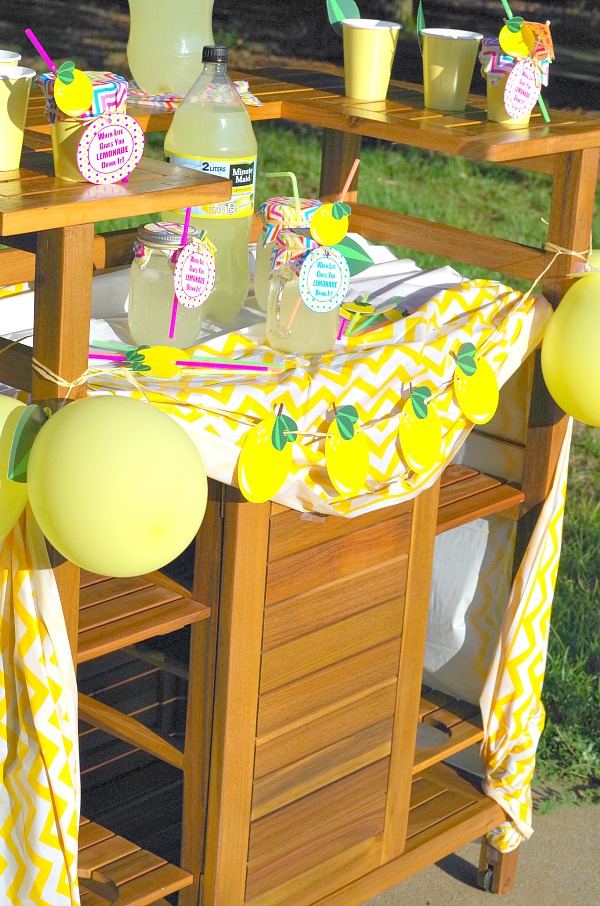 Fun yellow and white colorful lemonade stand with free printable